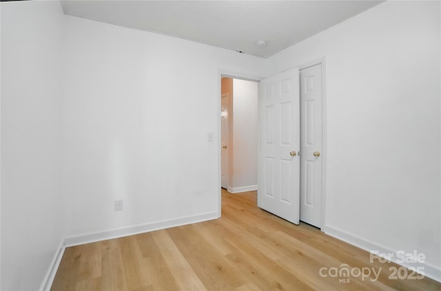 1162 Willet Dr, Rock Hill, SC 29732 - unfurnished bedroom with light wood-style floors and baseboards