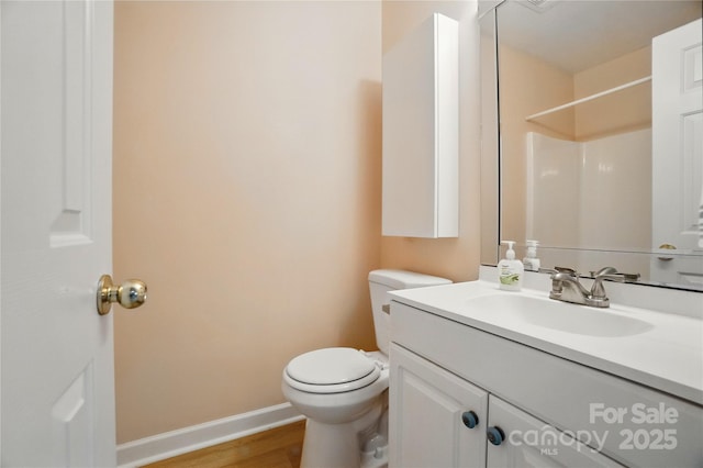 1162 Willet Dr, Rock Hill, SC 29732 - full bathroom featuring wood finished floors, toilet, vanity, baseboards, and a shower