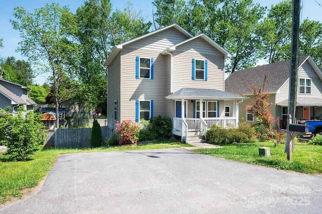 92 Le-An-Hurst Rd, Asheville, NC 28803 - traditional-style house with a porch and fence