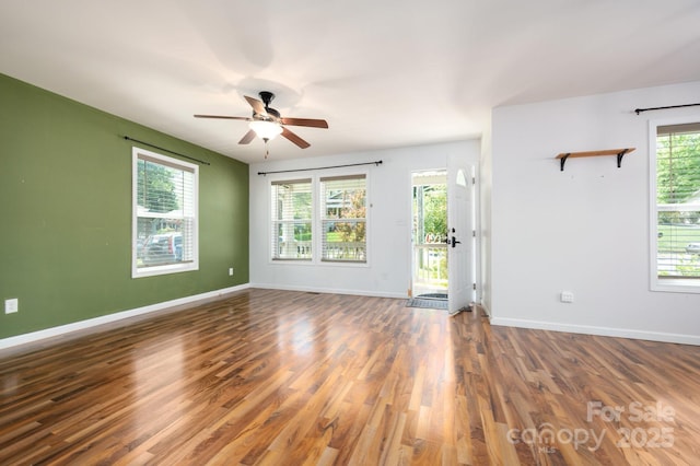 92 Le-An-Hurst Rd, Asheville, NC 28803 - unfurnished room featuring ceiling fan, wood finished floors, and baseboards
