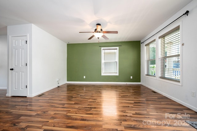 92 Le-An-Hurst Rd, Asheville, NC 28803 - spare room featuring a ceiling fan, wood finished floors, and baseboards