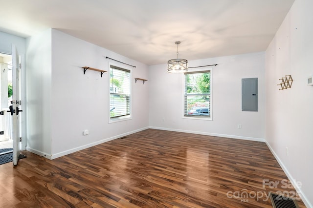92 Le-An-Hurst Rd, Asheville, NC 28803 - unfurnished room with electric panel, dark wood finished floors, a chandelier, and baseboards