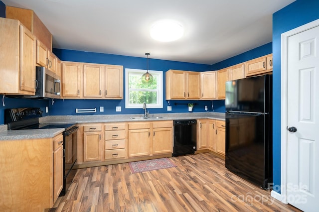 92 Le-An-Hurst Rd, Asheville, NC 28803 - kitchen with black appliances, light brown cabinetry, a sink, and light wood-style flooring