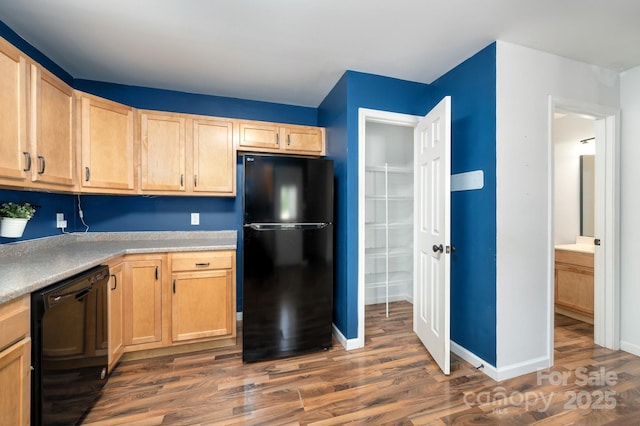 92 Le-An-Hurst Rd, Asheville, NC 28803 - kitchen with black appliances, dark wood-type flooring, light brown cabinetry, and light countertops