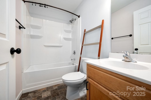 92 Le-An-Hurst Rd, Asheville, NC 28803 - full bathroom featuring toilet, vanity, stone finish floors, baseboards, and tub / shower combination