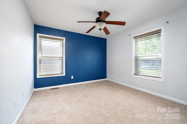 92 Le-An-Hurst Rd, Asheville, NC 28803 - spare room featuring carpet floors, a ceiling fan, and baseboards