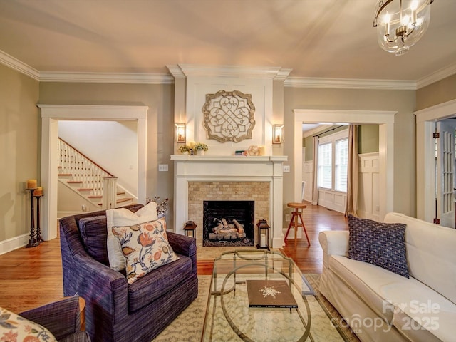 226 Union St S, Concord, NC 28025 - living area with wood finished floors, stairway, ornamental molding, a fireplace, and baseboards
