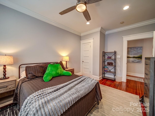 226 Union St S, Concord, NC 28025 - bedroom with wood finished floors, crown molding, recessed lighting, baseboards, and ceiling fan