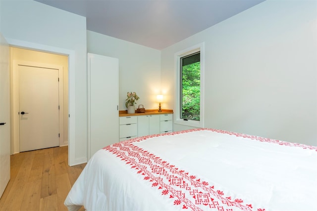 bedroom with light wood-style flooring