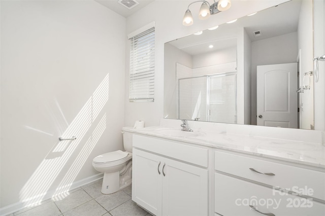 2021 Boynton St, Charlotte, NC 28269 - bathroom with tile patterned flooring, a shower stall, toilet, vanity, and baseboards