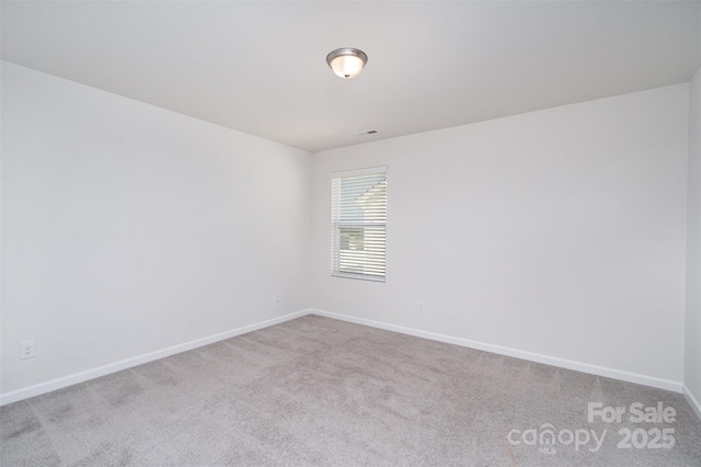 2021 Boynton St, Charlotte, NC 28269 - unfurnished room featuring carpet floors and baseboards