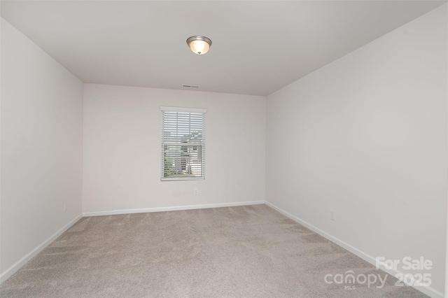 2021 Boynton St, Charlotte, NC 28269 - unfurnished room featuring light colored carpet and baseboards
