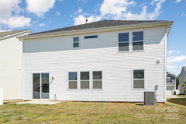 2021 Boynton St, Charlotte, NC 28269 - back of house with central air condition unit and a yard