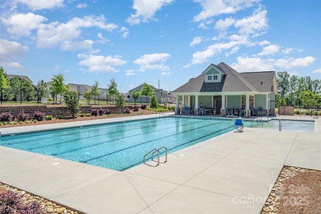 2021 Boynton St, Charlotte, NC 28269 - community pool featuring fence, a patio, and a residential view