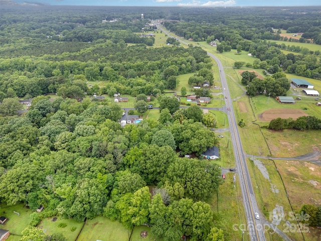 5240 Old Monroe Rd, Indian Trail, NC 28079 - aerial overview of property's location featuring a heavily wooded area