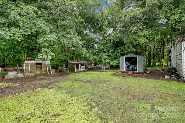 5240 Old Monroe Rd, Indian Trail, NC 28079 - view of green lawn featuring exterior structure