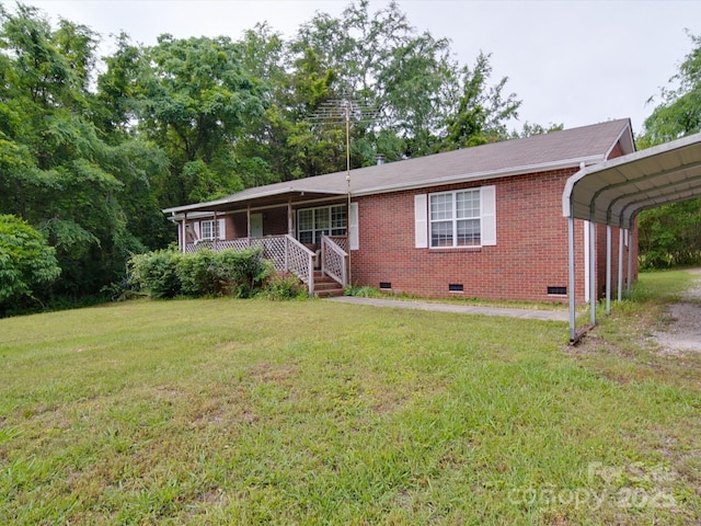 single story home with brick siding, a detached carport, crawl space, a front yard, and a porch