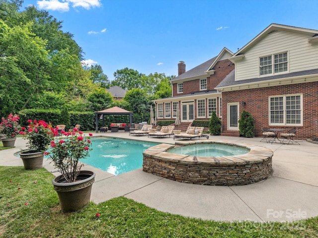 13029 Whisper Creek Dr, Charlotte, NC 28277 - view of swimming pool featuring outdoor lounge area, a patio, an in-ground hot tub, entry steps, and french doors