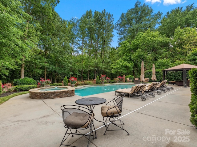 13029 Whisper Creek Dr, Charlotte, NC 28277 - view of pool with a gazebo, a patio area, and a pool with connected hot tub