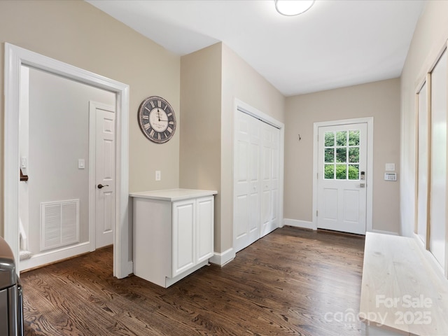 13029 Whisper Creek Dr, Charlotte, NC 28277 - entrance foyer with dark wood-style floors and baseboards
