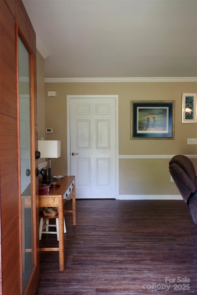 office featuring crown molding, dark wood finished floors, and baseboards