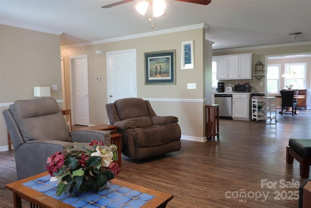 living area with crown molding, baseboards, ceiling fan, and dark wood-style floors
