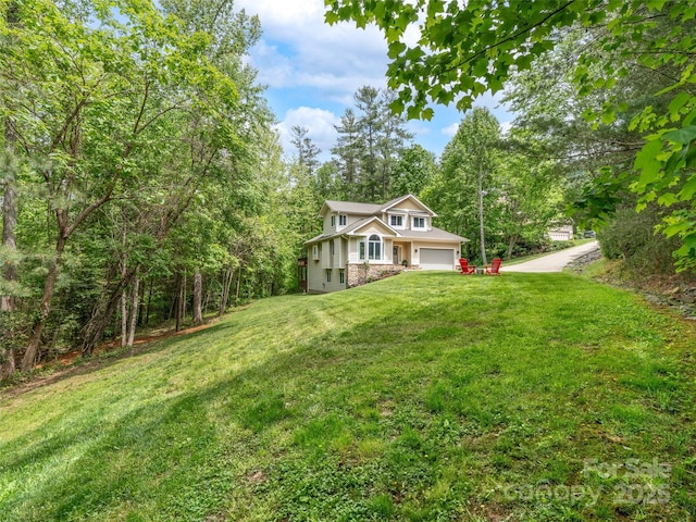 33 Village Pointe Ln, Asheville, NC 28803 - view of front of house featuring a garage and a front lawn