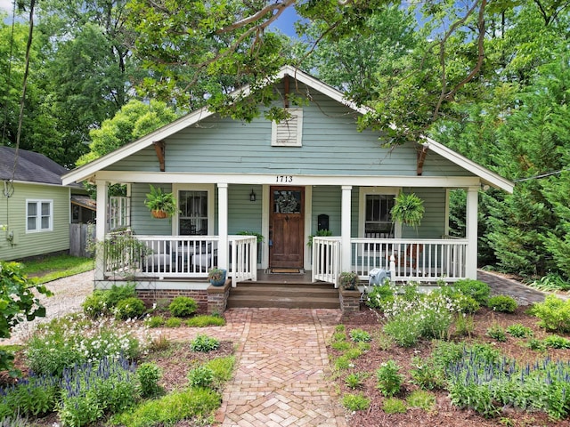 bungalow-style home featuring covered porch
