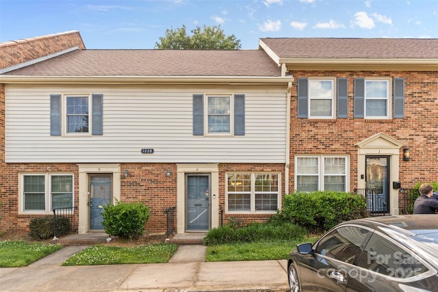 multi unit property with brick siding