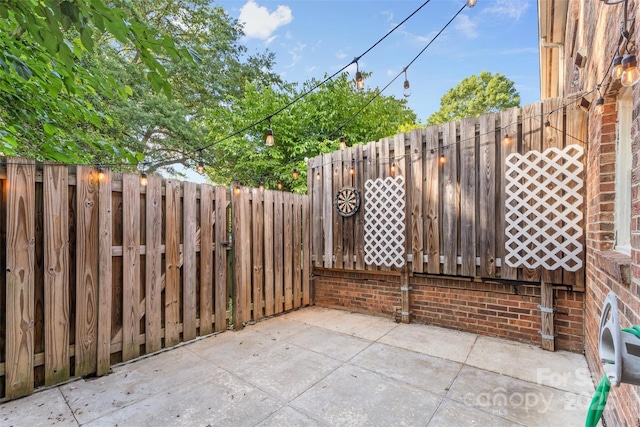 view of patio with a fenced backyard