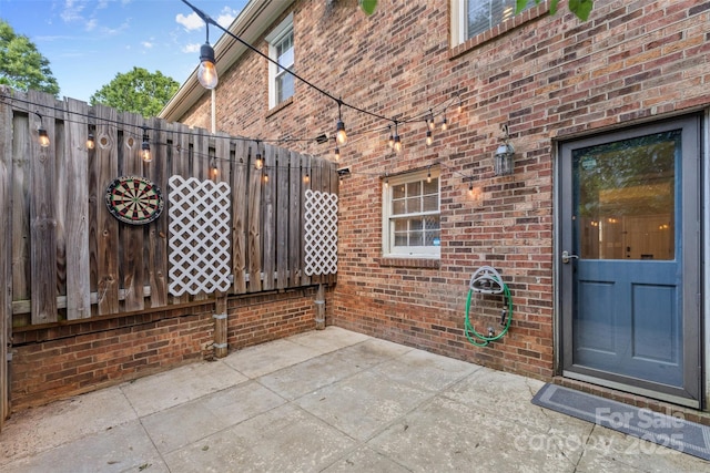 view of patio / terrace with fence