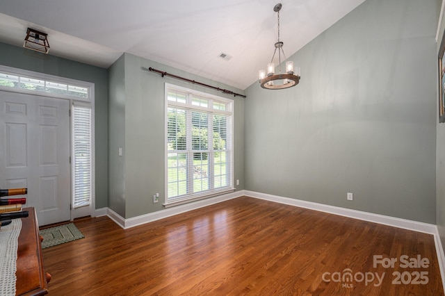 319 Beacon Hills Dr, Gastonia, NC 28056 - entrance foyer with wood finished floors, a chandelier, baseboards, and high vaulted ceiling