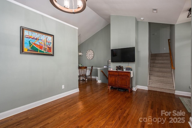 319 Beacon Hills Dr, Gastonia, NC 28056 - living room with dark wood finished floors, baseboards, stairs, and lofted ceiling