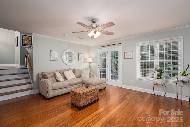 319 Beacon Hills Dr, Gastonia, NC 28056 - living area featuring ceiling fan, wood finished floors, stairway, baseboards, and ornamental molding
