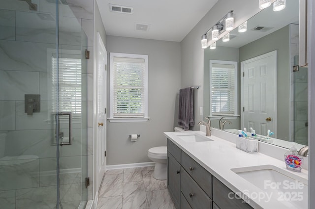 319 Beacon Hills Dr, Gastonia, NC 28056 - full bath featuring toilet, double vanity, healthy amount of natural light, and marble finish flooring