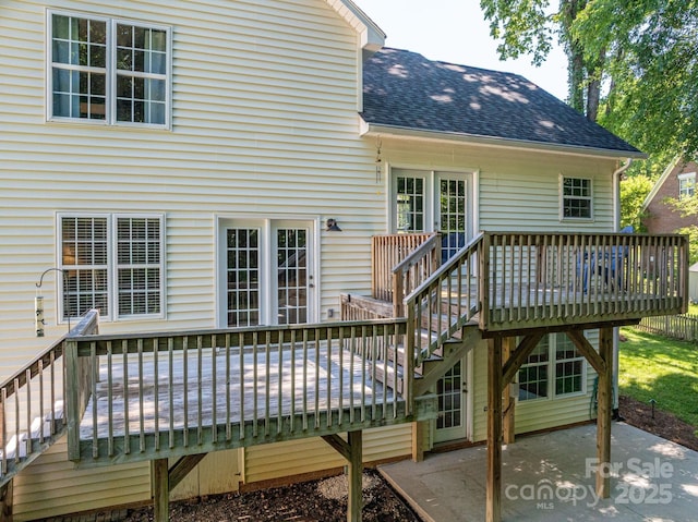 319 Beacon Hills Dr, Gastonia, NC 28056 - back of property featuring a shingled roof, a patio area, a wooden deck, and stairway
