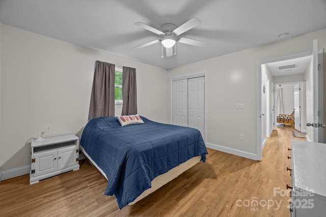 1077 Jackson Rd, Fort Lawn, SC 29714 - bedroom featuring light wood finished floors, baseboards, a closet, and a ceiling fan