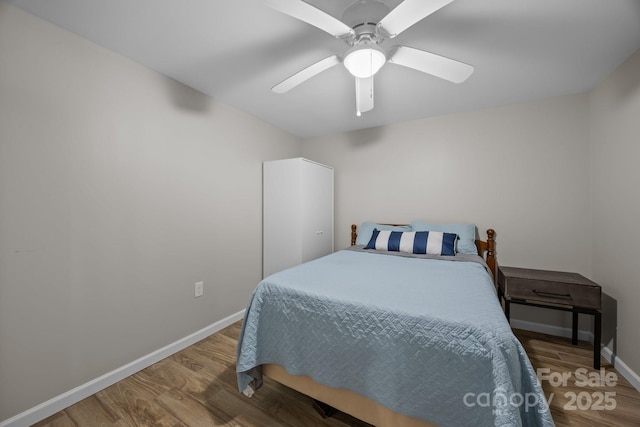 1077 Jackson Rd, Fort Lawn, SC 29714 - bedroom with baseboards, wood finished floors, and a ceiling fan