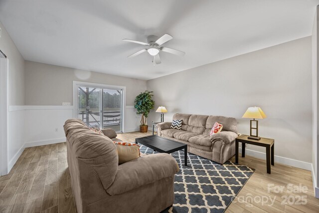 1077 Jackson Rd, Fort Lawn, SC 29714 - living room featuring a ceiling fan, wood finished floors, and baseboards