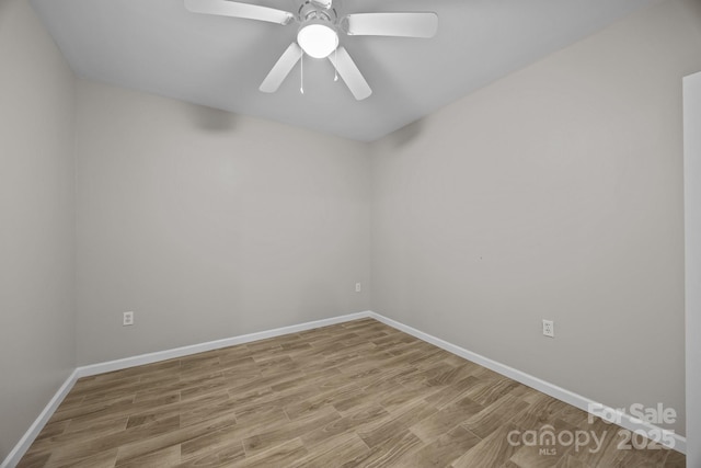 1077 Jackson Rd, Fort Lawn, SC 29714 - unfurnished room featuring wood finished floors, baseboards, and a ceiling fan