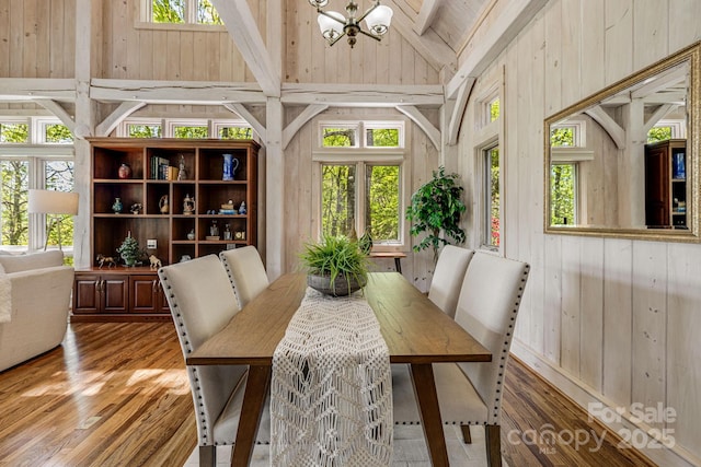 sunroom with a chandelier and healthy amount of natural light