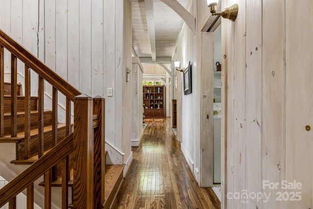 corridor with wood-type flooring, stairway, and wooden ceiling