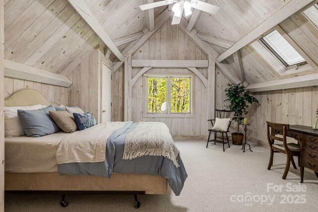 carpeted bedroom with a skylight, wooden walls, and wood ceiling