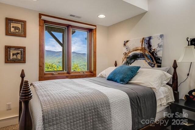 bedroom featuring recessed lighting