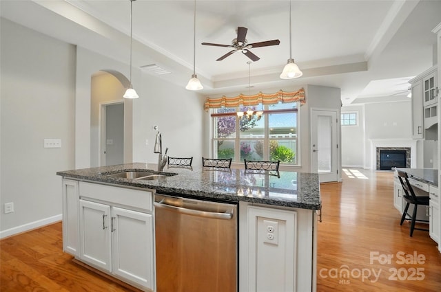 5028 Polo Gate Blvd, Charlotte, NC 28216 - kitchen featuring dishwasher, a raised ceiling, a sink, a ceiling fan, and crown molding