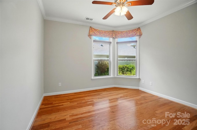 5028 Polo Gate Blvd, Charlotte, NC 28216 - unfurnished room featuring light wood-type flooring, crown molding, a ceiling fan, and baseboards
