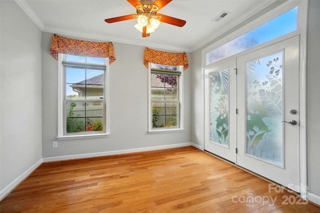 5028 Polo Gate Blvd, Charlotte, NC 28216 - unfurnished room with crown molding, light wood-style floors, baseboards, and a ceiling fan