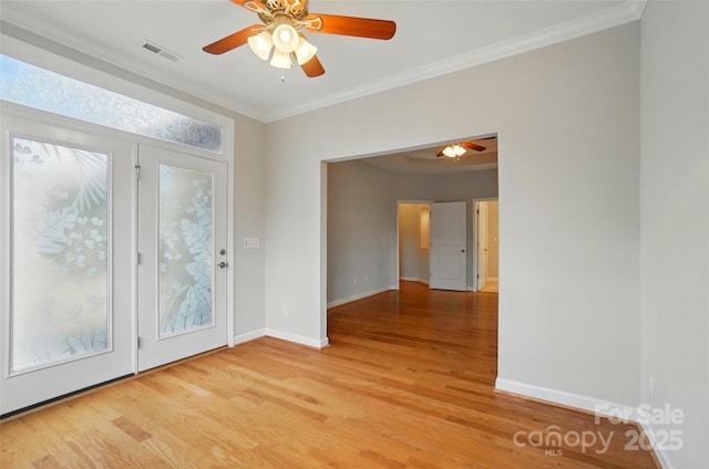 5028 Polo Gate Blvd, Charlotte, NC 28216 - unfurnished room with light wood finished floors, a ceiling fan, ornamental molding, and baseboards