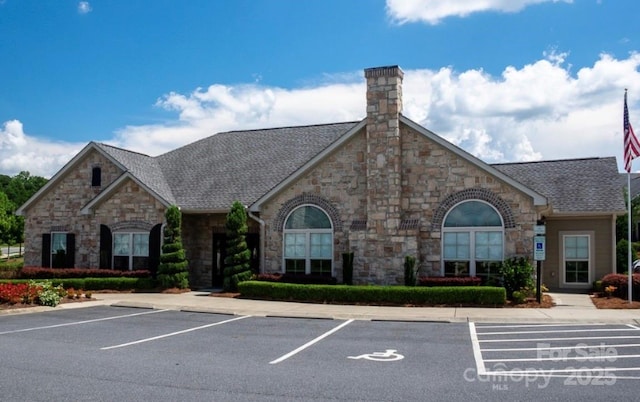 5028 Polo Gate Blvd, Charlotte, NC 28216 - view of property featuring uncovered parking