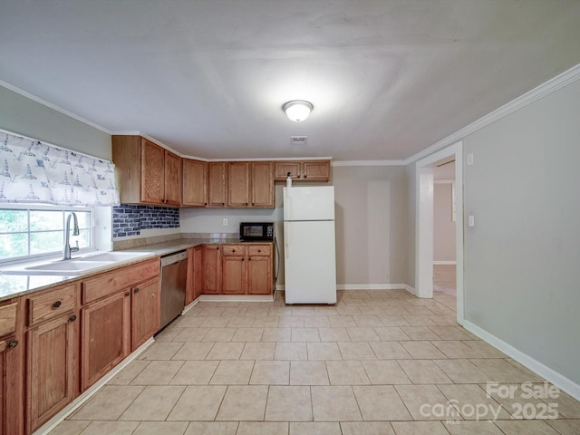 363 Sowers Rd, Linwood, NC 27299 - kitchen with freestanding refrigerator, a sink, dishwasher, black microwave, and crown molding